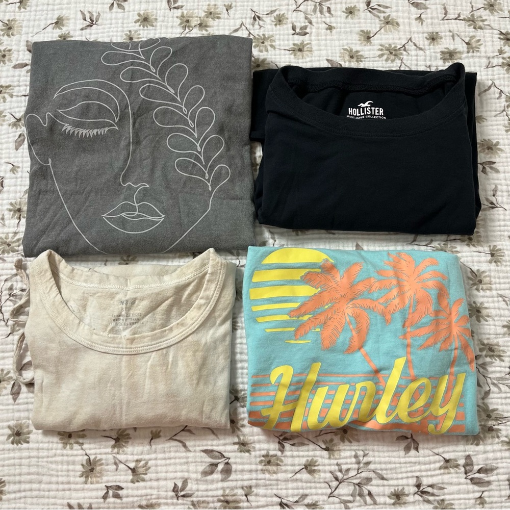 4 Pack Women’s Tees. Sizes Small & Medium.